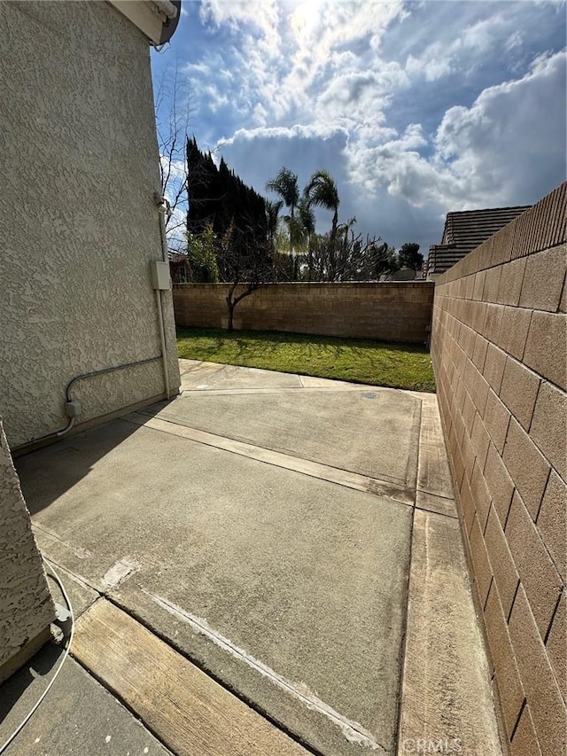 view of patio with a fenced backyard