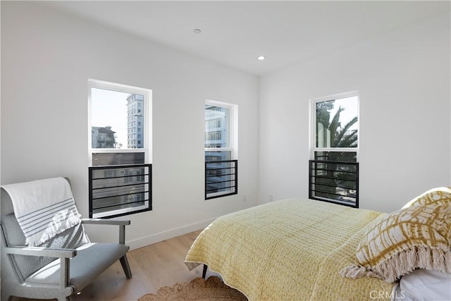 1903 N Stoke Ln, Los Angeles, CA 90068 - bedroom with light wood-type flooring, baseboards, and recessed lighting