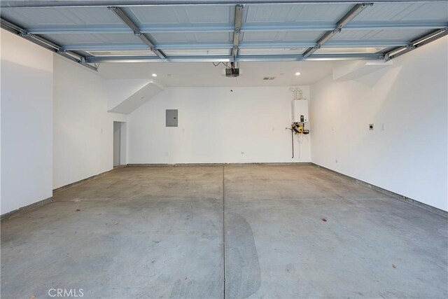 1903 N Stoke Ln, Los Angeles, CA 90068 - garage featuring water heater, a garage door opener, and electric panel