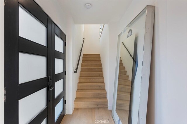 1903 N Stoke Ln, Los Angeles, CA 90068 - stairs featuring wood finished floors