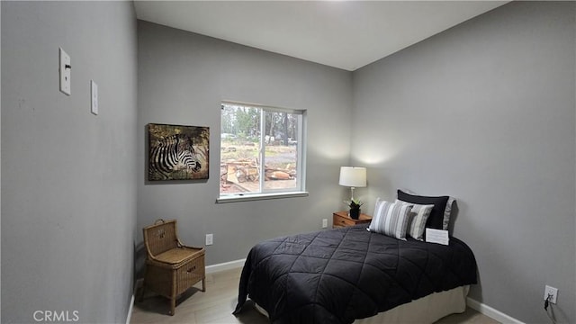 bedroom featuring baseboards