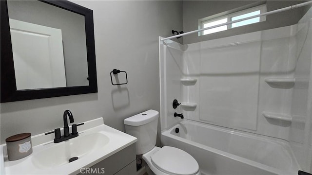 full bath featuring shower / bath combination, toilet, and vanity