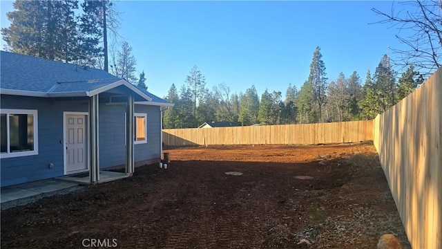 view of yard featuring a fenced backyard