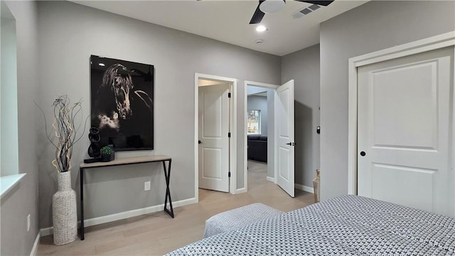 bedroom with ceiling fan, light wood-style flooring, recessed lighting, visible vents, and baseboards