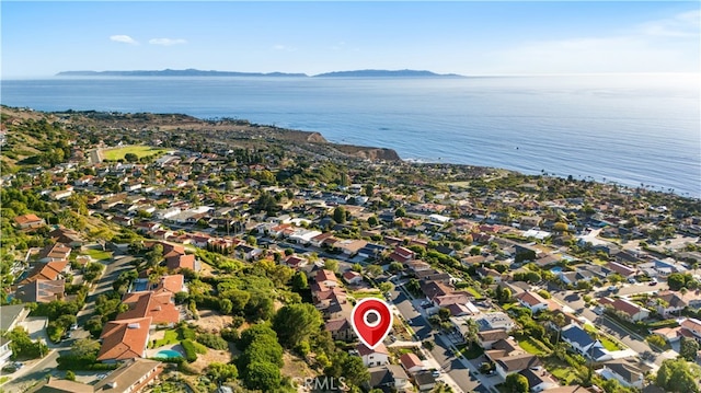 birds eye view of property with a residential view and a water and mountain view