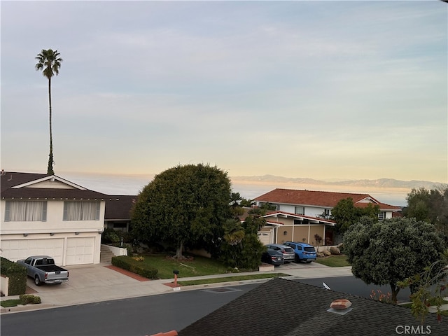 view of front of home featuring a garage and concrete driveway