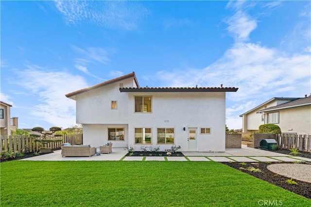 back of house with a patio area, a yard, outdoor lounge area, and a fenced backyard