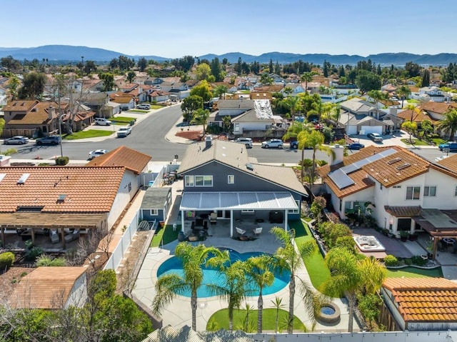 drone / aerial view with a residential view and a mountain view