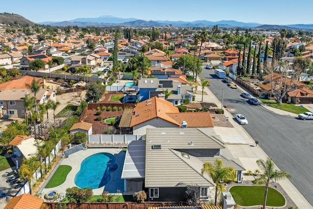 drone / aerial view with a mountain view and a residential view