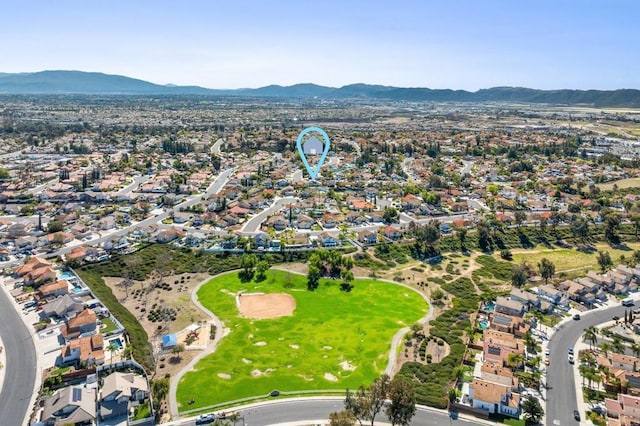 bird's eye view featuring a residential view, a mountain view, and golf course view