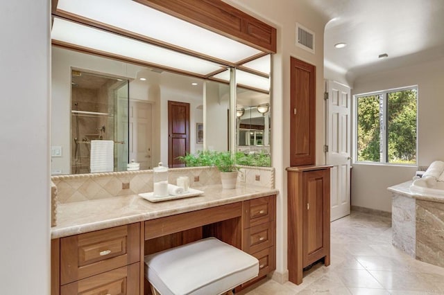 bathroom featuring vanity, visible vents, backsplash, a shower stall, and a tub with marble appearance