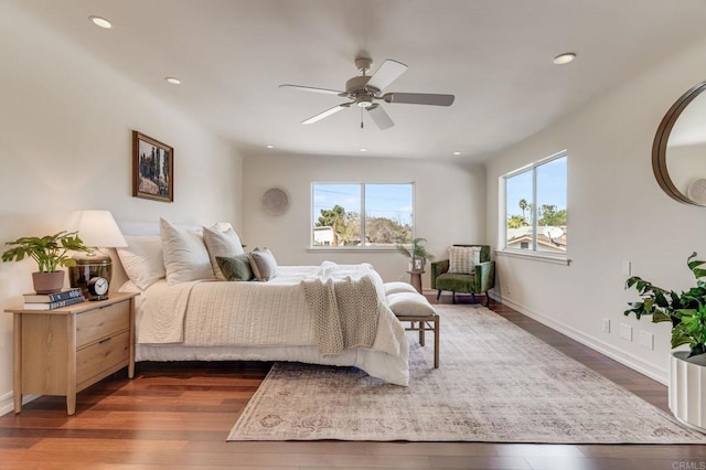 bedroom with baseboards, dark wood finished floors, a ceiling fan, and recessed lighting