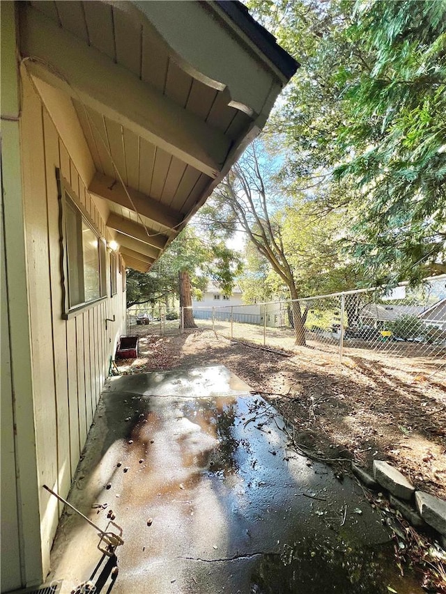 view of yard with a patio area and fence