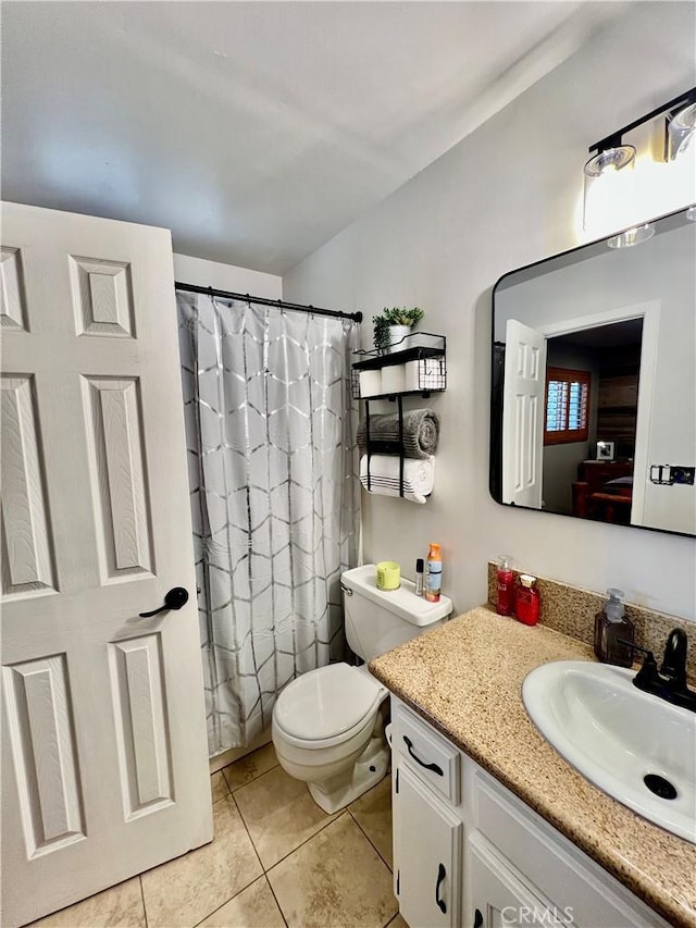 370 Weisshorn Dr, Crestline, CA 92325 - full bathroom with toilet, a shower with curtain, tile patterned flooring, and vanity