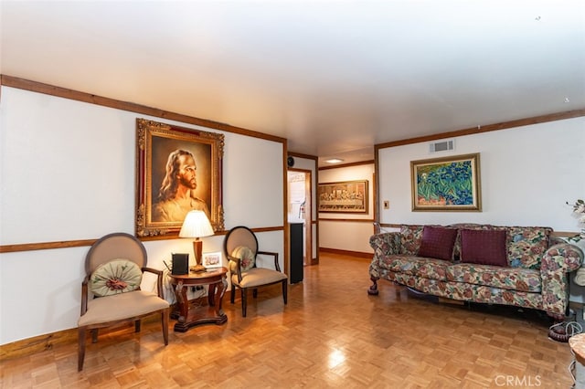 living area with baseboards and visible vents