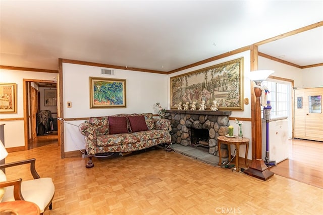 living room with a stone fireplace, ornamental molding, visible vents, and parquet floors