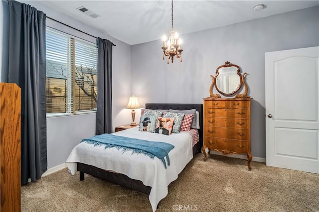 bedroom featuring baseboards, visible vents, and light colored carpet