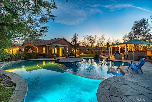 pool featuring a patio area