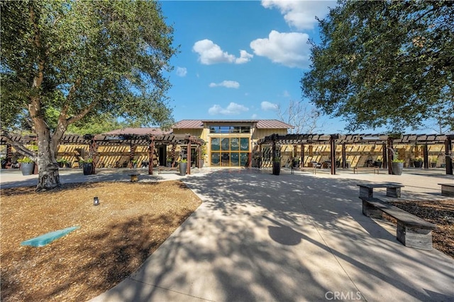 exterior space with a pergola