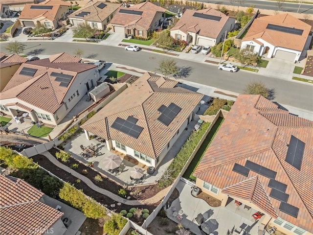 birds eye view of property with a residential view