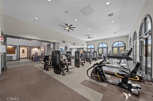 gym featuring a ceiling fan, light colored carpet, visible vents, and recessed lighting