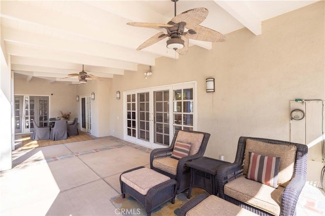 view of patio / terrace with ceiling fan and french doors