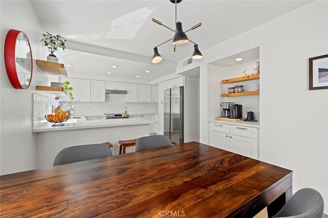 dining space with visible vents