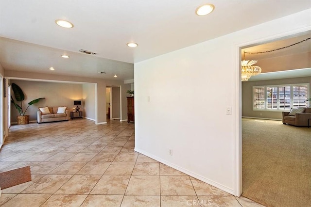 spare room with recessed lighting, visible vents, baseboards, and light tile patterned floors