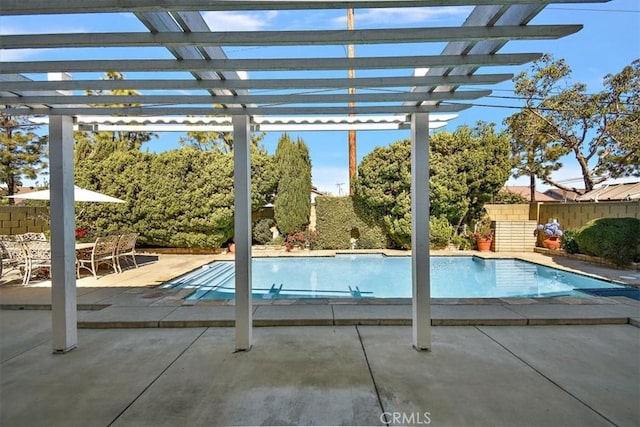 view of pool with a fenced backyard, a fenced in pool, a pergola, and a patio