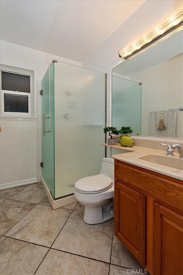 full bath featuring toilet, a stall shower, tile patterned floors, and vanity