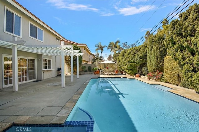 outdoor pool featuring a patio, fence, grilling area, and a pergola