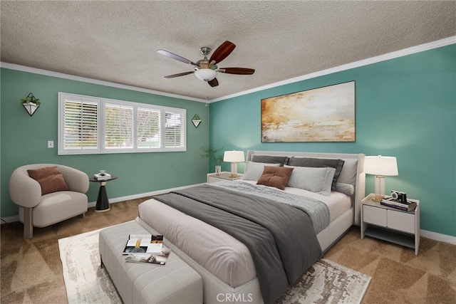 bedroom featuring baseboards, light carpet, and crown molding