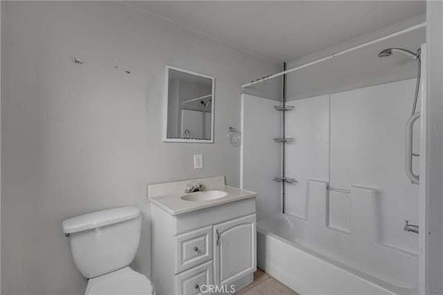 bathroom featuring bathtub / shower combination, vanity, toilet, and tile patterned floors