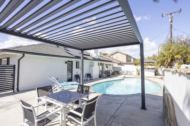 view of swimming pool with outdoor dining area, a patio area, a fenced backyard, and a fenced in pool