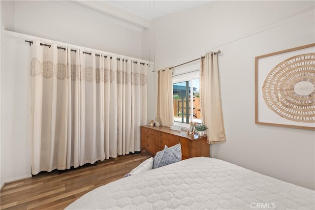 bedroom with wood finished floors