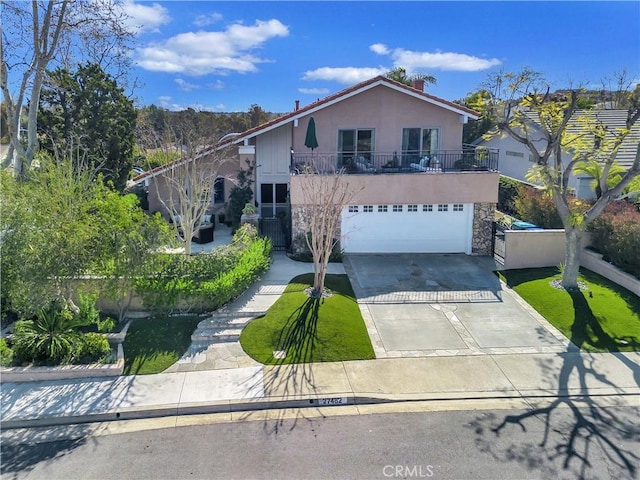 view of front of home with an attached garage, concrete driveway, stone siding, stucco siding, and a chimney