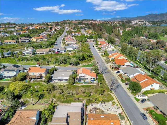 bird's eye view with a residential view and a mountain view