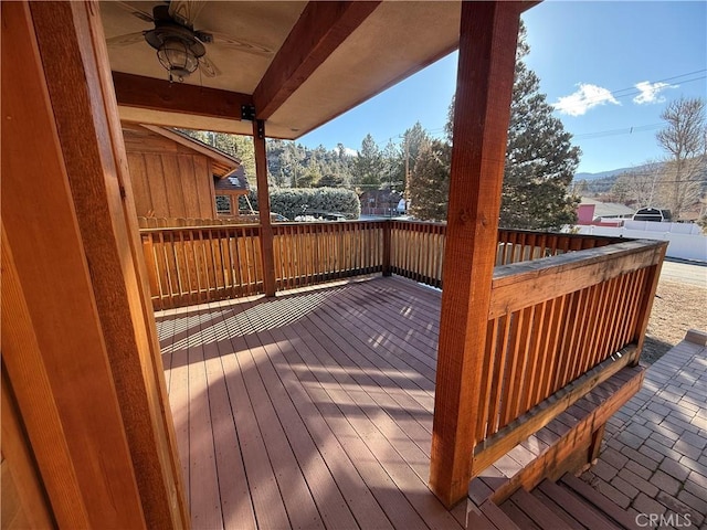 wooden terrace with ceiling fan