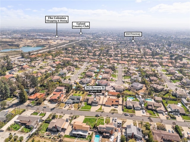 bird's eye view with a water view and a residential view