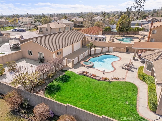 birds eye view of property with a residential view