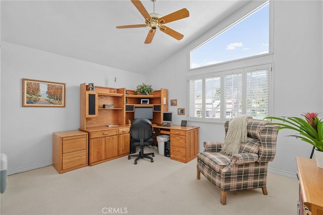 home office featuring high vaulted ceiling, light colored carpet, and ceiling fan