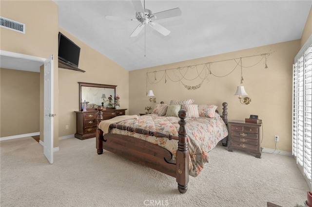 bedroom featuring baseboards, visible vents, vaulted ceiling, and light colored carpet