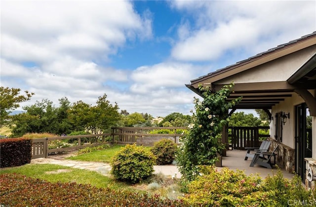 view of yard featuring fence