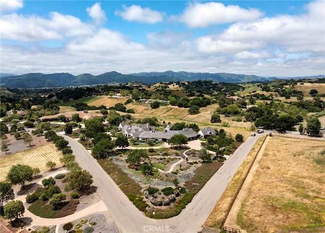 drone / aerial view featuring a mountain view