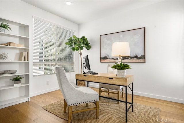 office area with recessed lighting, wood finished floors, and baseboards