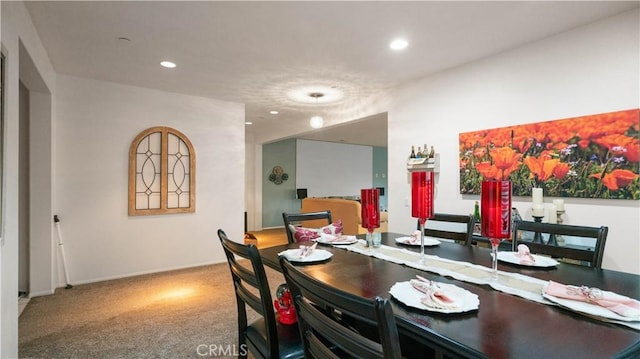 dining area with recessed lighting, carpet flooring, and baseboards