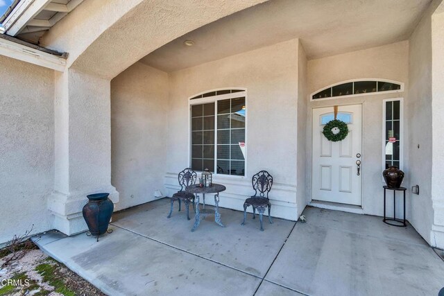 17717 Bangor Ave, Hesperia, CA 92345 - property entrance with stucco siding and covered porch