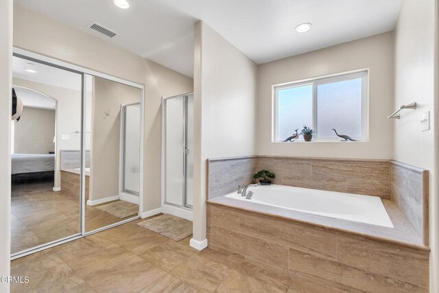17717 Bangor Ave, Hesperia, CA 92345 - ensuite bathroom with a stall shower, a bath, and recessed lighting