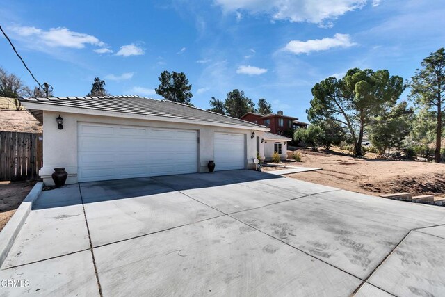 17717 Bangor Ave, Hesperia, CA 92345 - view of front of property featuring a tile roof, stucco siding, and driveway