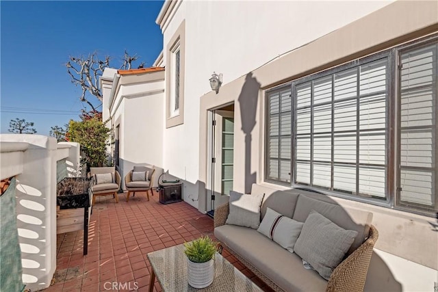 view of patio / terrace with an outdoor hangout area